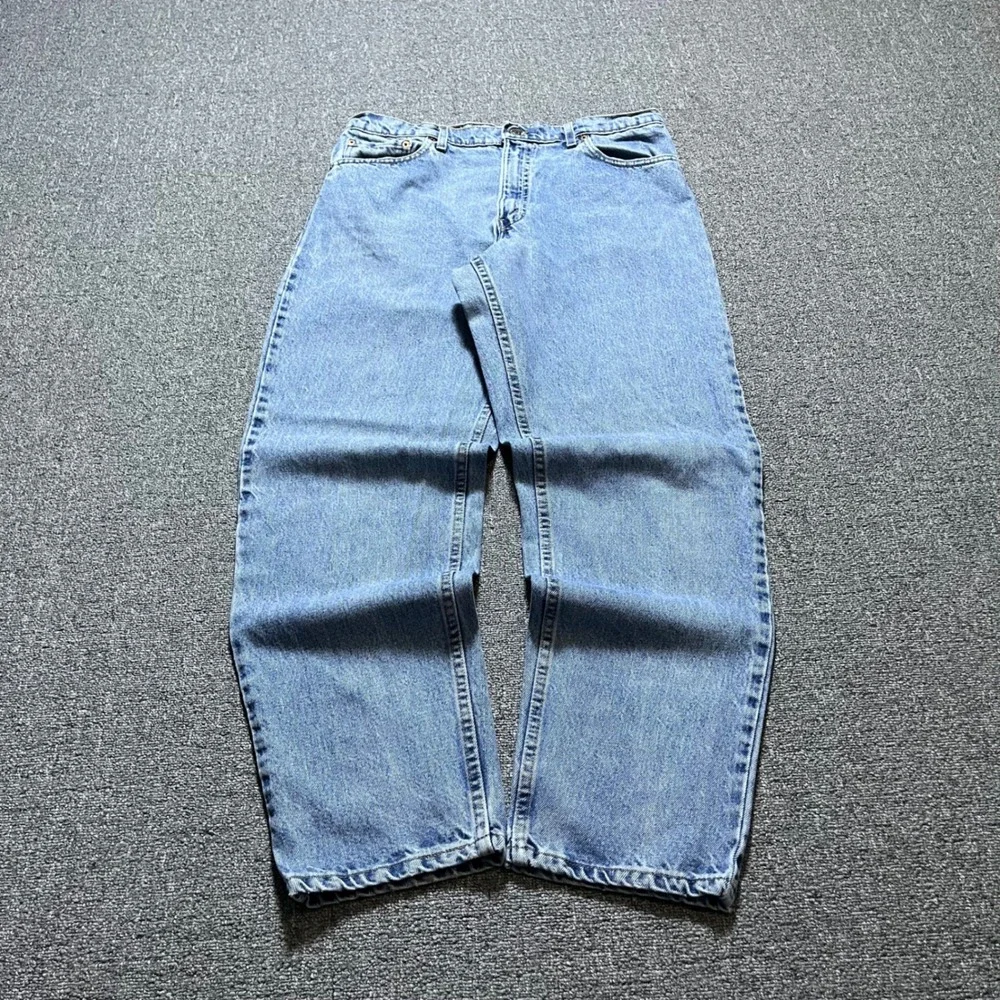 Vintage Levis 550 Relaxed Fit Tapered Leg Jeans 36x32 Blue Light Wash 90s USA